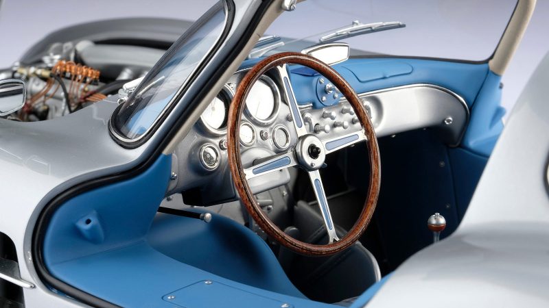 The Amalgam Collection scale model of the Mercedes‑Benz 300 SLR Uhlenhaut Coupe features ultra-detailed craftsmanship, silver bodywork, and historically accurate automotive design.