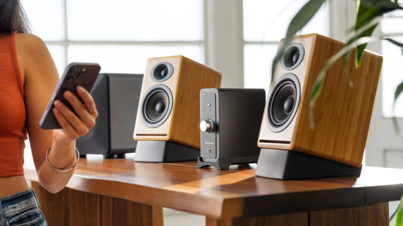 Audioengine Stereo Flex Kit featuring P4 passive speakers and N22 desktop amplifier with Bluetooth aptX, headphone amp, 4-ohm impedance, and modern wood or matte finishes.