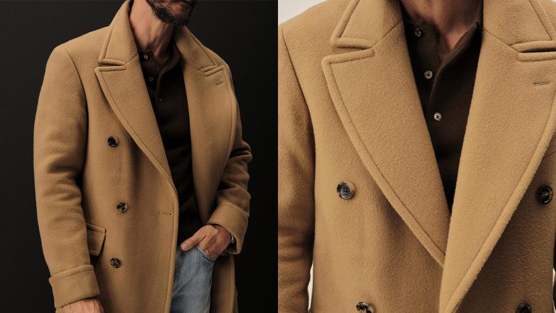 Buck Mason’s Camel Chukker Club Polo Coat in Italian wool features a double-breasted front, postbox pockets, and a classic tailored silhouette