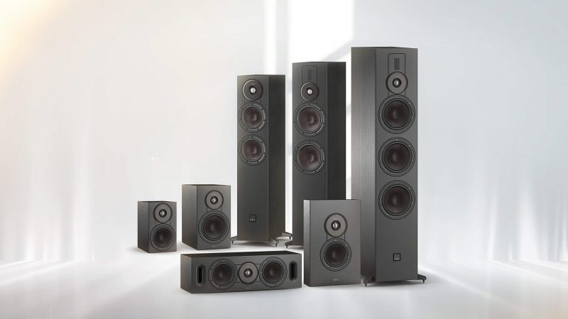 The DALI SONIK Series loudspeakers in Natural Oak and Walnut finishes feature Hybrid Tweeter modules, wood fiber Clarity Cones, and aluminum outriggers.