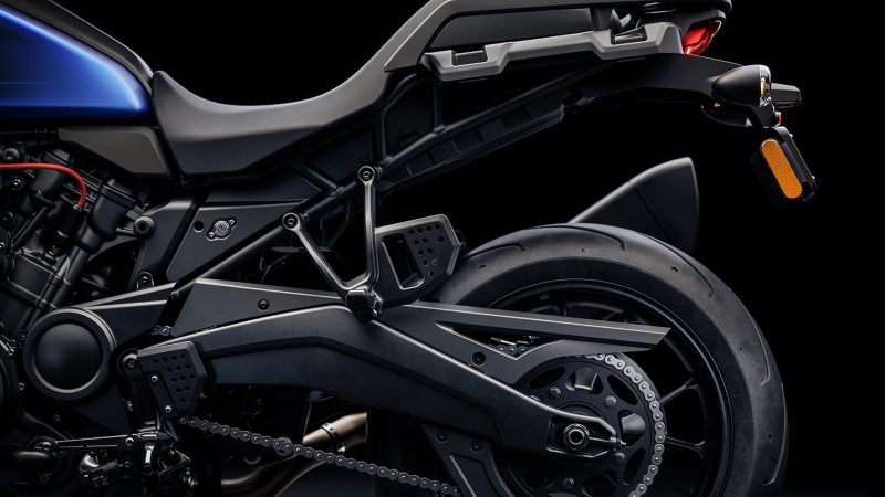 The 2026 Harley-Davidson Pan America 1250 ST motorcycle in Aurora Blue Denim features a blacked-out powertrain, 17-inch cast wheels, and a low smoked windshield.