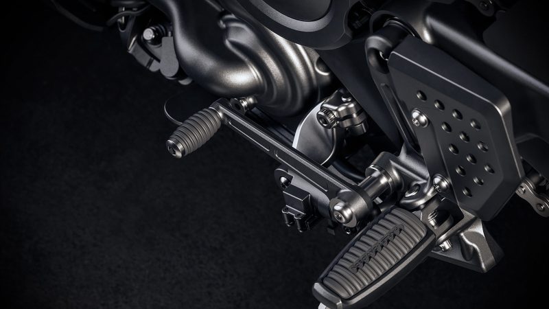 The 2026 Harley-Davidson Pan America 1250 ST motorcycle in Aurora Blue Denim features a blacked-out powertrain, 17-inch cast wheels, and a low smoked windshield.