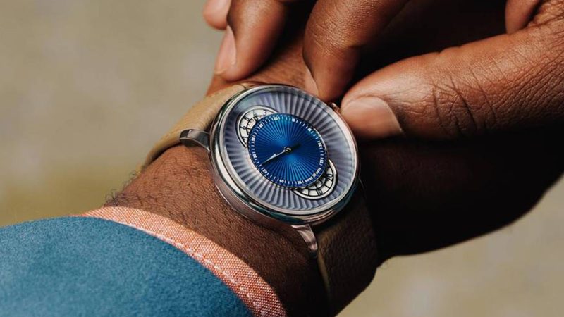 The Louis Erard x Worn & Wound Le Régulateur watch features a layered blue regulator dial, a polished steel case, Swiss automatic movement, and is a limited edition.