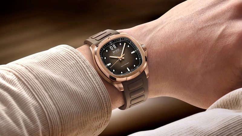 The MIDO Multifort TV Big Date watch features a retro TV-shaped case, a Big Date complication at 12 o’clock, a Caliber 80 automatic movement, and a Nivachron balance spring.