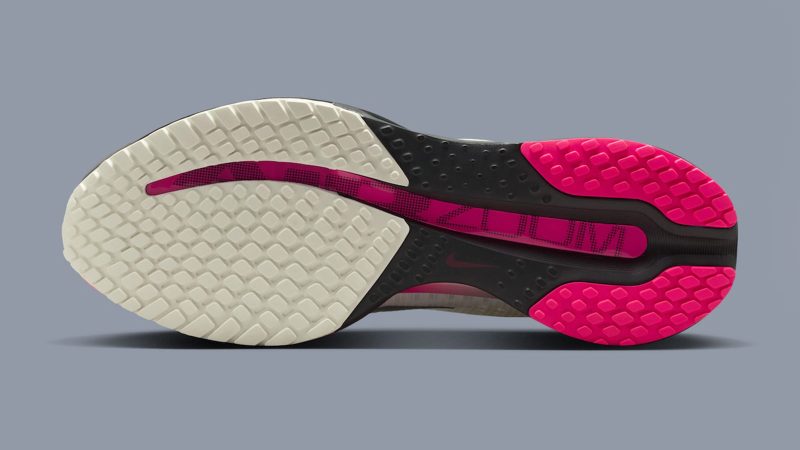 The Nike Pegasus Premium Year of the Horse sneaker features a jade and anthracite gradient mesh upper, wing-shaped heel tags, and a pink-accented ZoomX midsole.