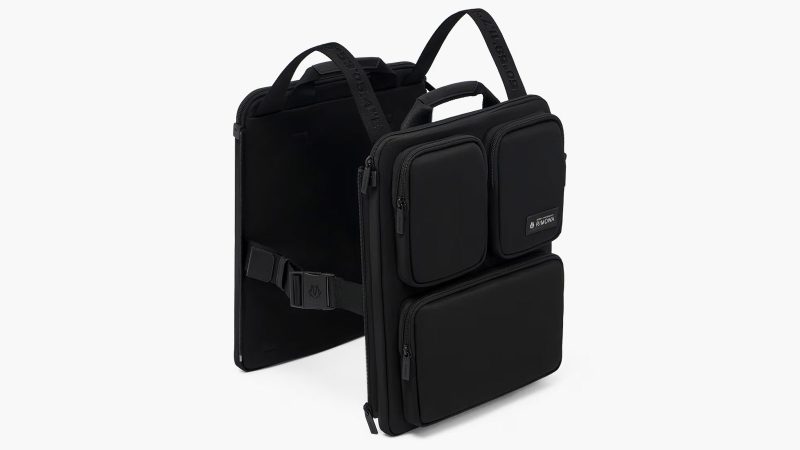 The RIMOWA Cabin Luggage Harness Backpack in recycled nylon with adjustable suitcase straps, hidden shoulder straps, dual laptop pockets, and modular travel organization.