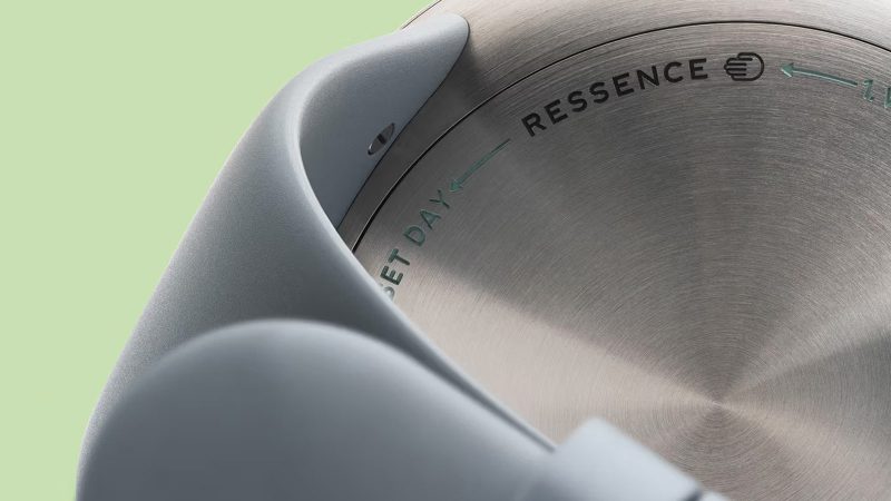 The Ressence x Marc Newson Type 3 MN oil-filled titanium watch with ROCS rotating discs, double-domed sapphire crystal, lug-less design, and limited-edition 80-piece release.