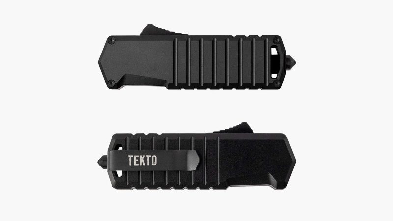 The TEKTO A2 Badger tactical folding knife with a black titanium-coated D2 steel blade and a lightweight carbon fiber handle.