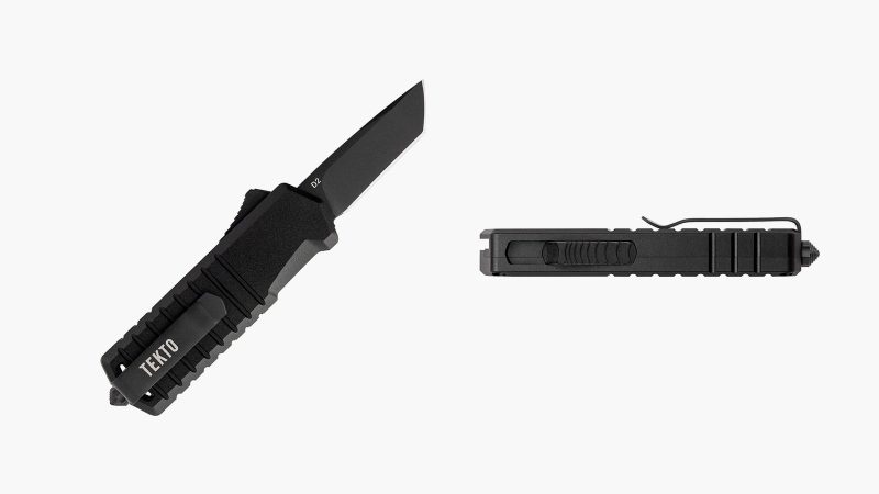 The TEKTO A2 Badger tactical folding knife with a black titanium-coated D2 steel blade and a lightweight carbon fiber handle.