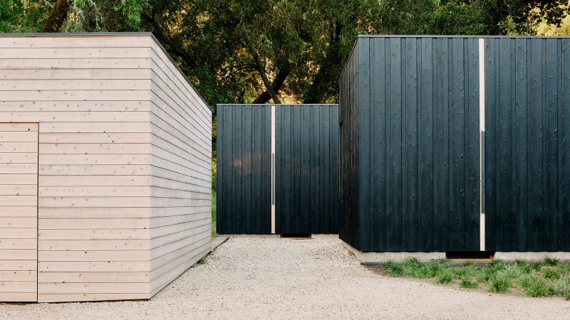 The Preserve I Home by Studio Schicketanz features modern modular architecture nestled between mature oak trees in a California meadow conservancy.