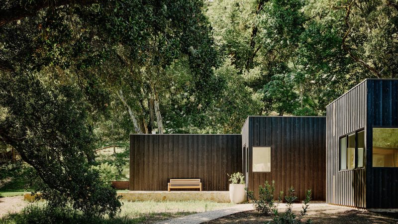 The Preserve I Home by Studio Schicketanz features modern modular architecture nestled between mature oak trees in a California meadow conservancy.