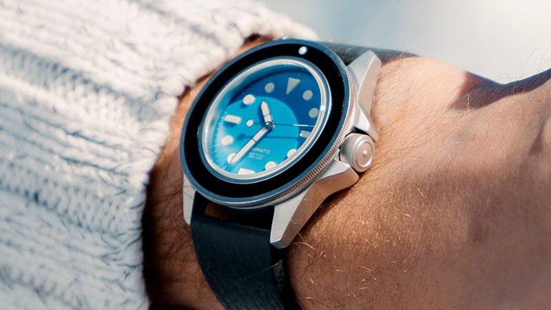 The UNIMATIC Italian Alps Collection watches with Alpine Sky Blue and Glacier White dials, 3D UNILIGHT lume markers, fumo deer leather straps, and 316L steel cases.