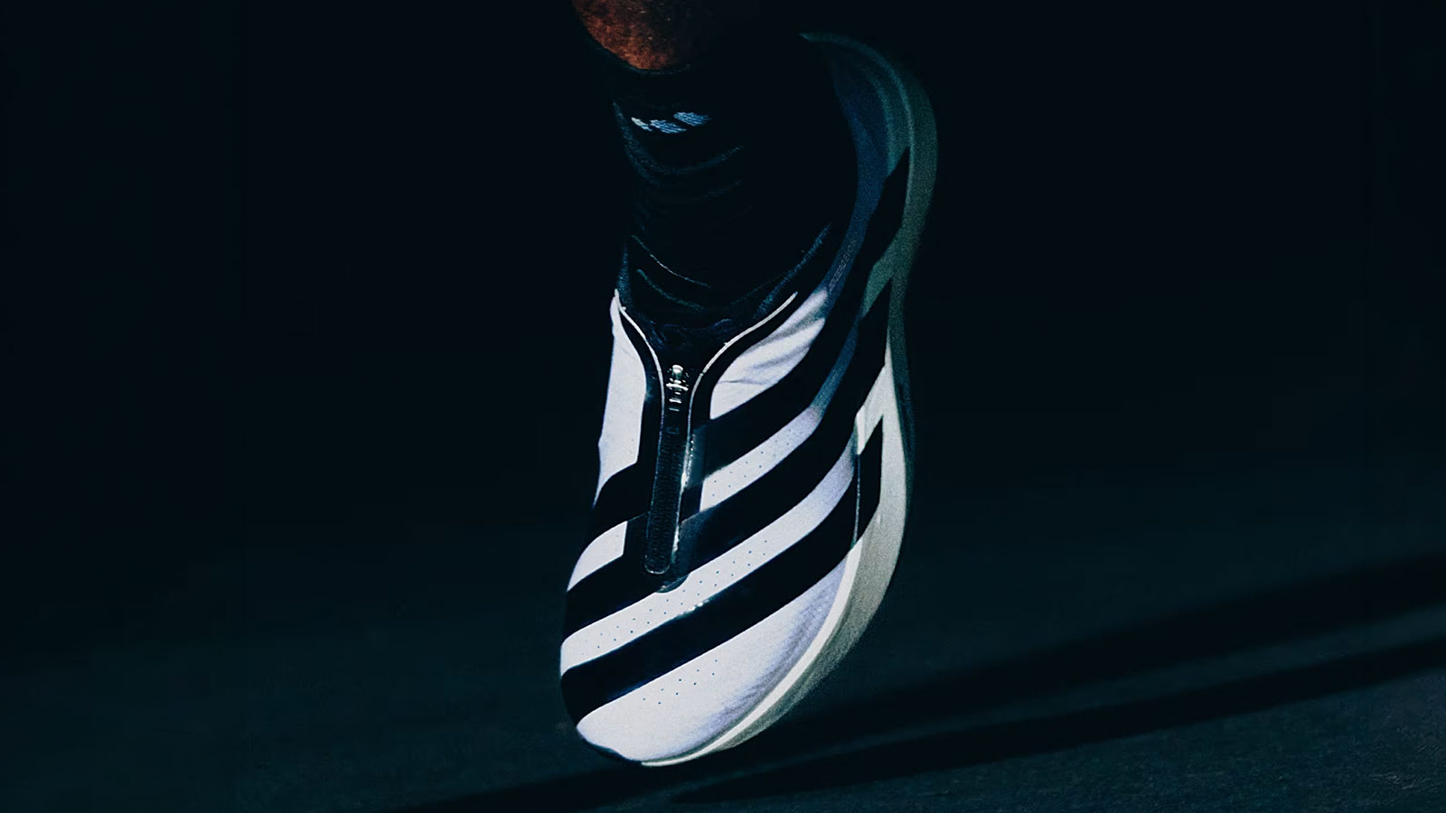 Adidas EVO SL Zip Covers Its Laces With a Throwback Twist